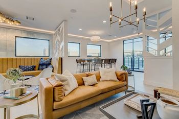 a living room with a couch and a table