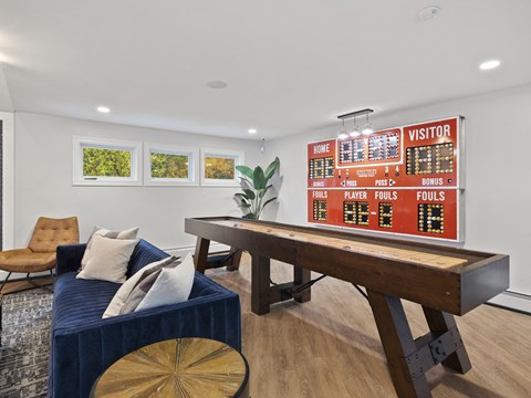 Game Room With Shuffle Board at Heritage at the River, Manchester, New Hampshire