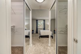 Hallway with two closets on both sides leading to the bedroom at Pembroke Pines Landings, Pembroke Pines, FL, 33025