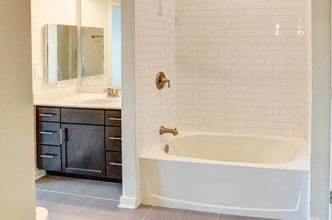 Bathroom with a tub and a sink  at The View at Old City, Philadelphia