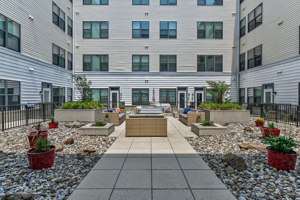Courtyard of an apartment building with gravel and plants  at The View at Old City, Philadelphia