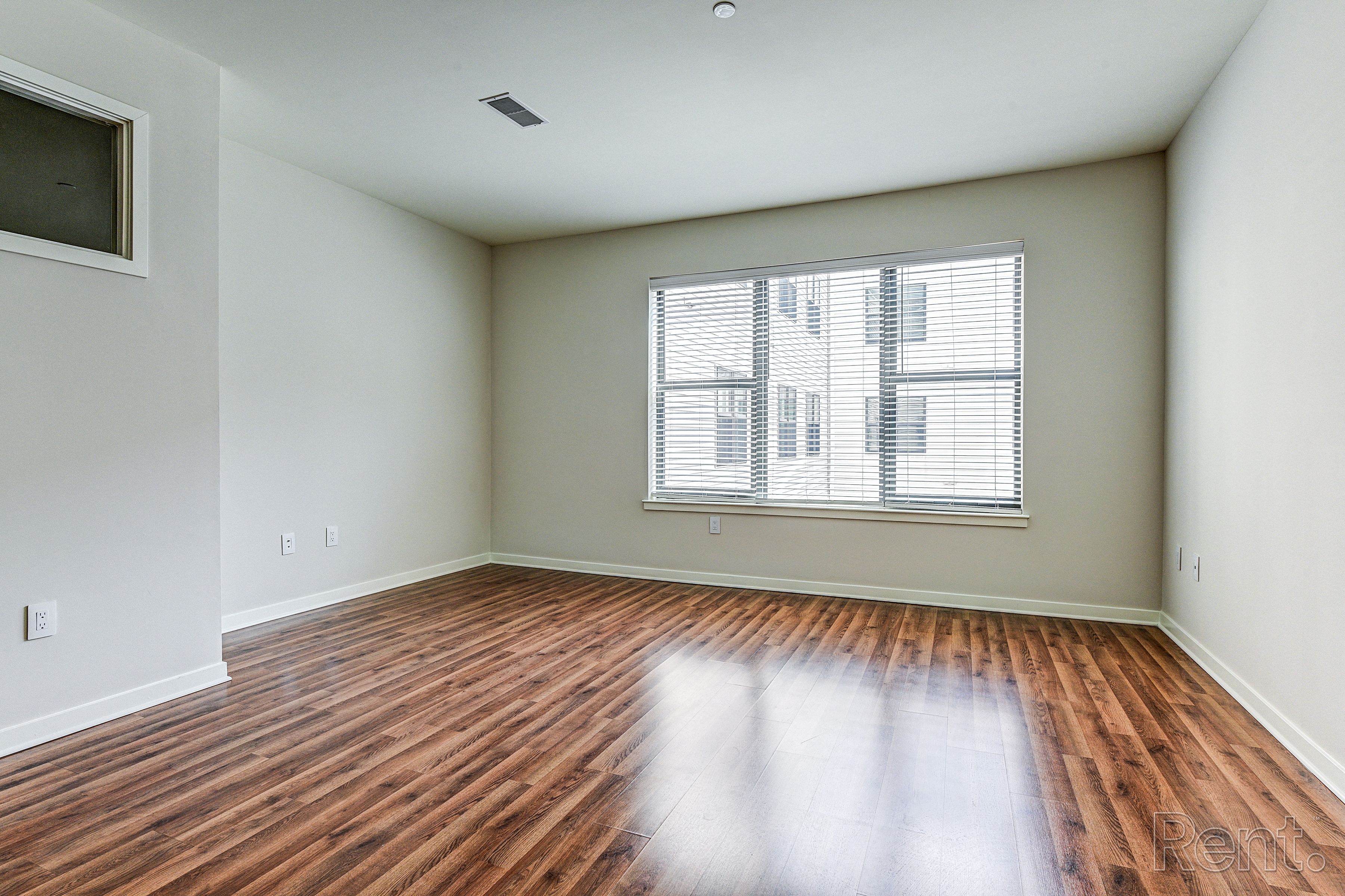 Livingroom with hardwood floors and a large window  at The View at Old City, Philadelphia