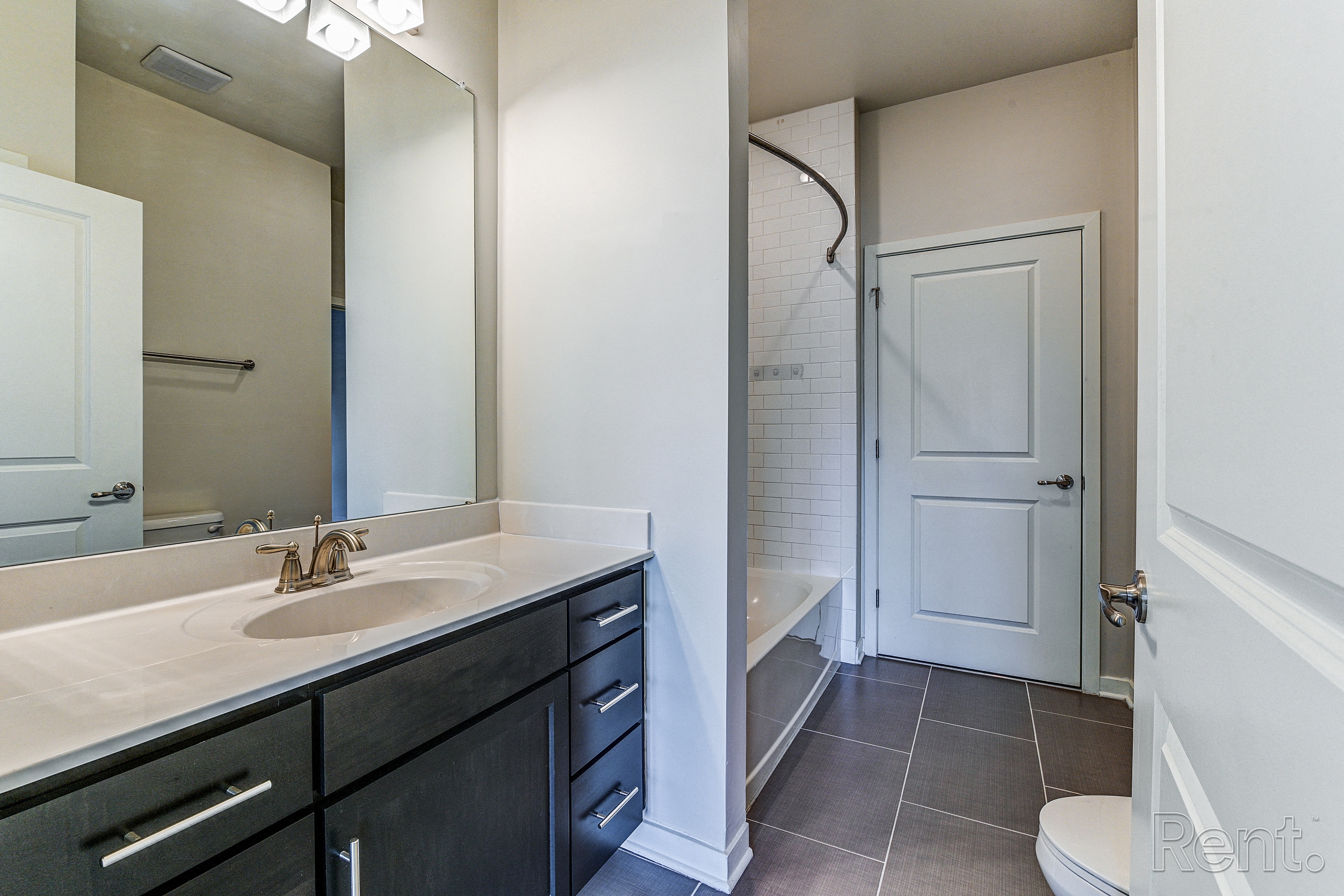 Bathroom with a large mirror  at The View at Old City, Philadelphia