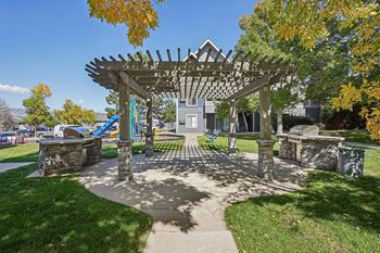 A park with a pavilion and a slide.