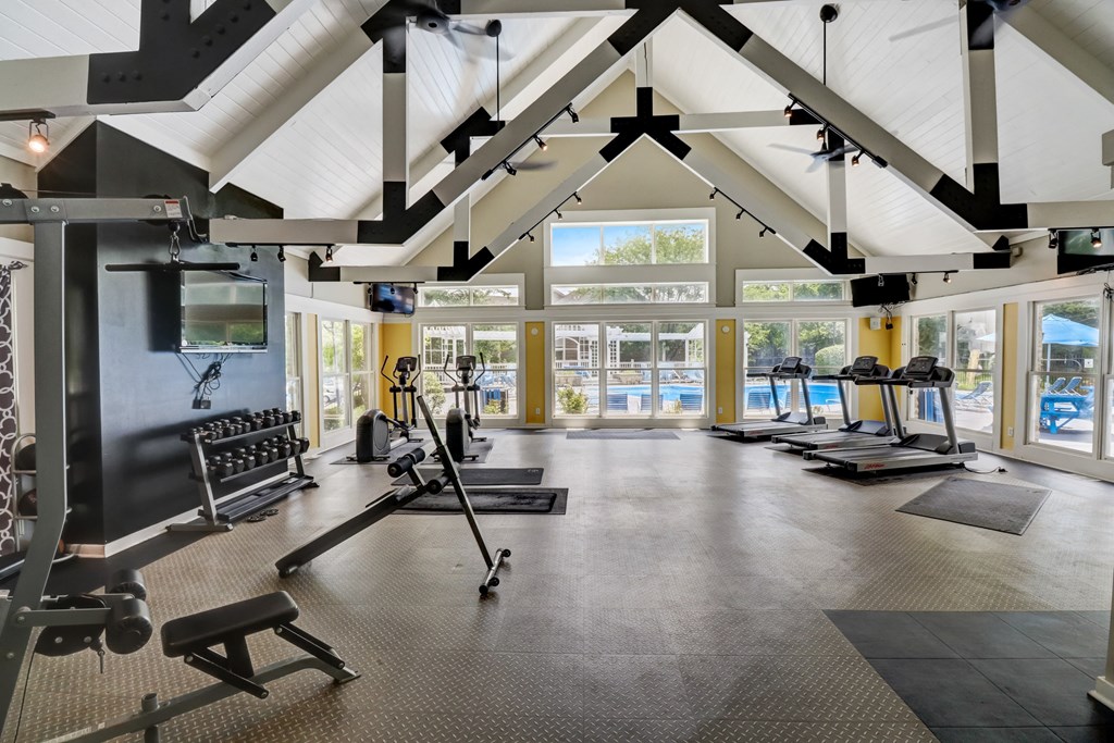 Large Fitness Room with Exercise Equipment and a View of the Pool at Brookstone Village, Cincinnati, Ohio