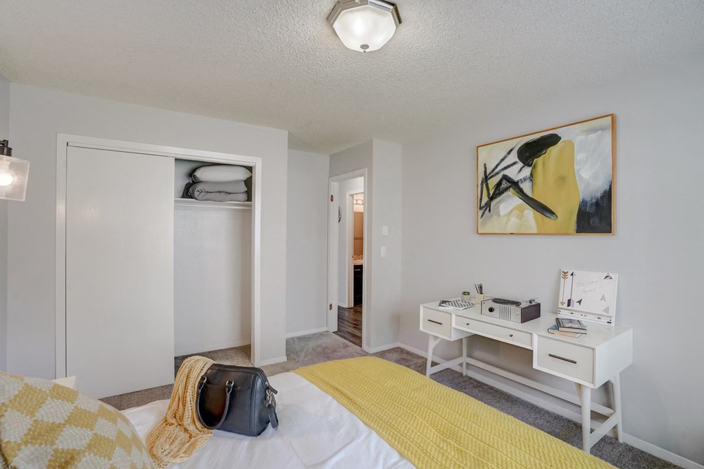 Bedroom with a white desk at Governor's Park, Fort Collins, 80525
