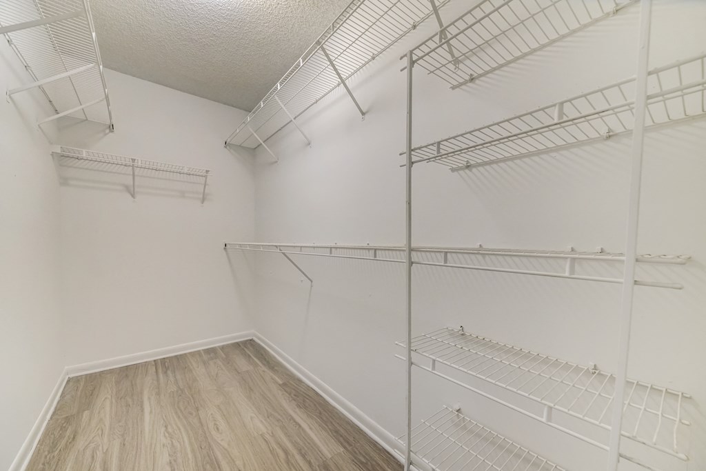 Walk in closet with shelving at Pembroke Pines Landings, Pembroke Pines, FL, 33025