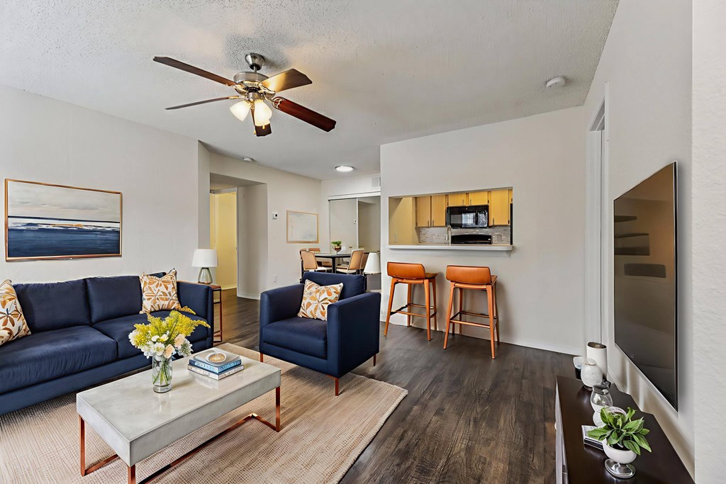 L:iving Room With Ceiling Fan at University Park Apartments, Orlando, Florida