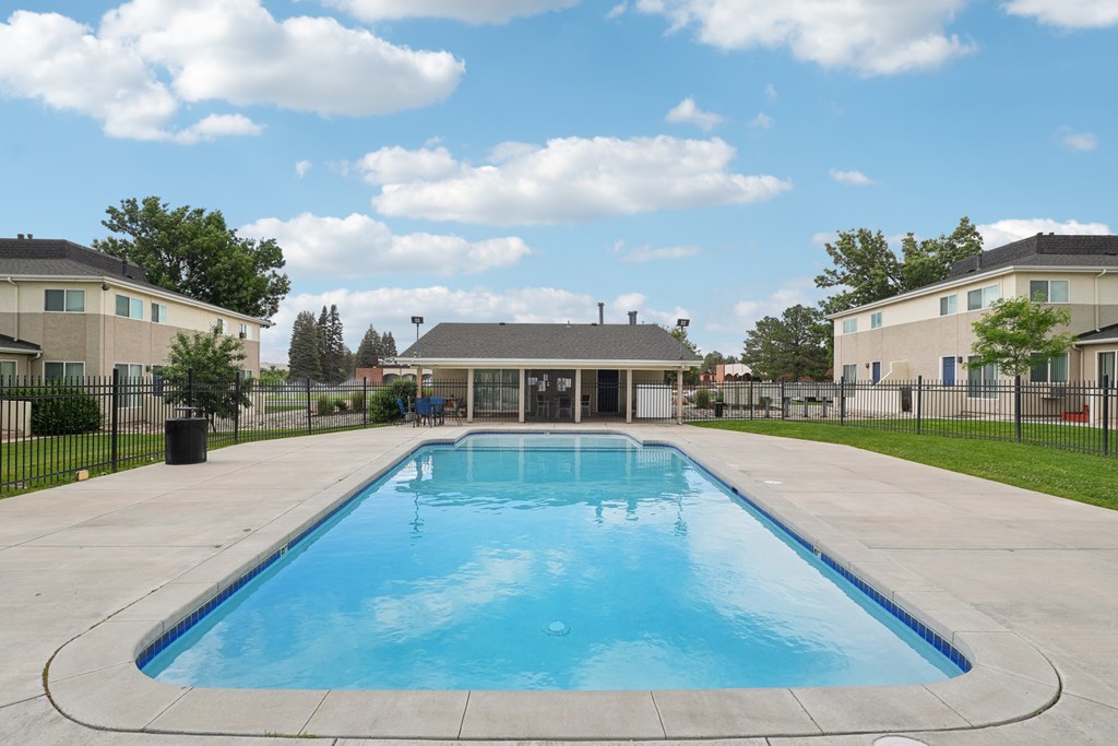 A large outdoor swimming pool at Aspen Townhomes, Colorado Springs, CO
