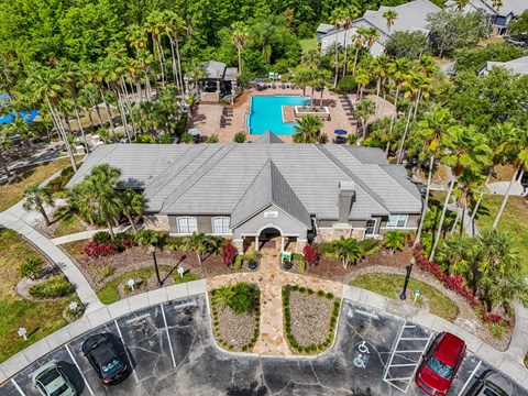 A large house with a pool in the backyard.