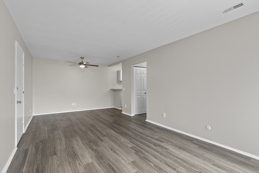 Livingroom with wood style flooring at Creve Coeur, Creve Coeur, MO
