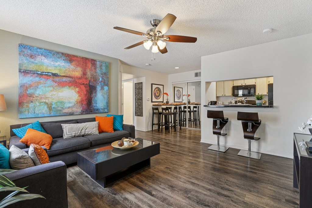Living Room With Kitchen at University Park Apartments, Orlando, 32817