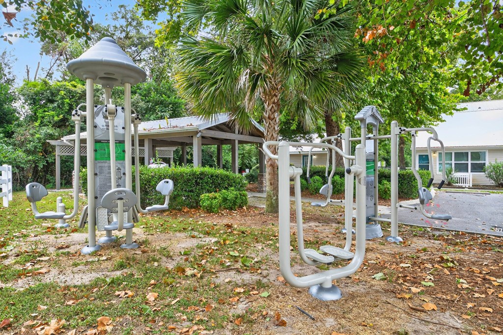 A park with exercise equipment and a gazebo.at Lofts of Wilmington, Wilmington, NC, 28405