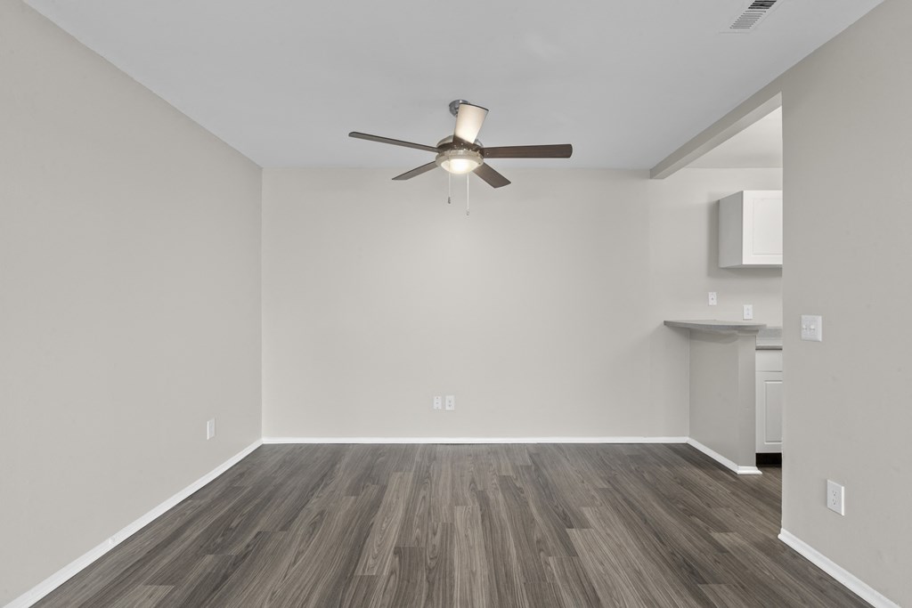 Living room with wood style flooring and a ceiling fan at Creve Coeur, Creve Coeur, MO