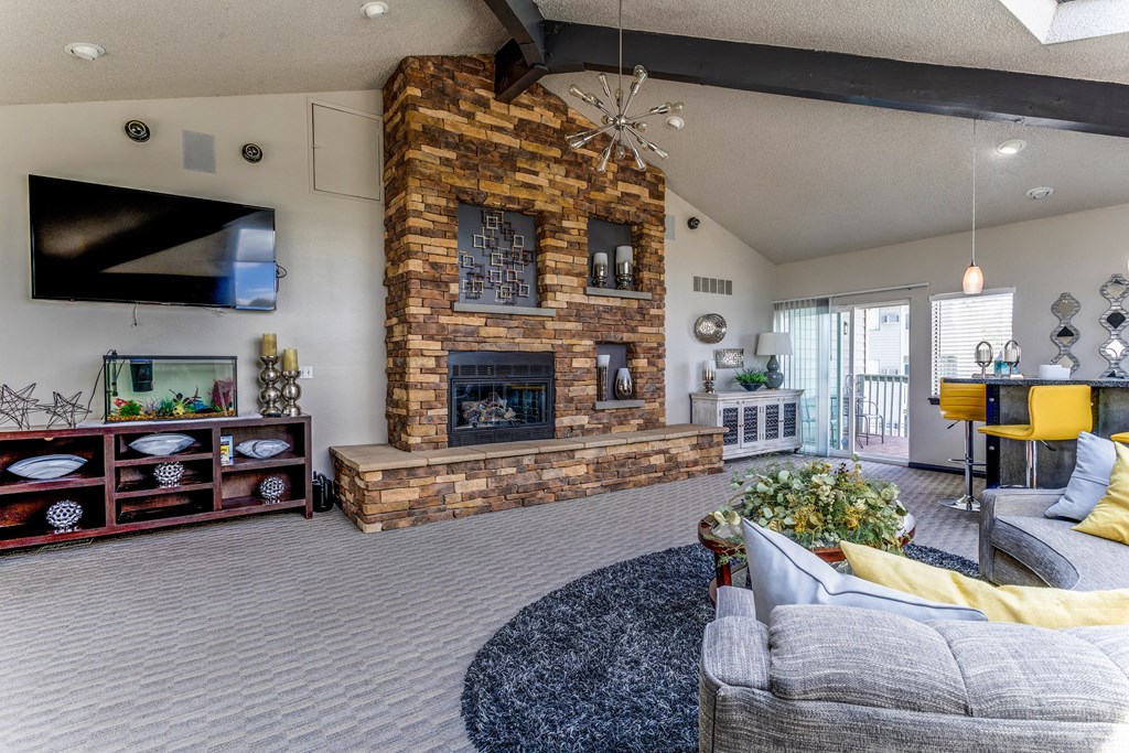 Clubhouse with fireplace and tv  at Union Heights Apartments, Colorado Springs, CO
