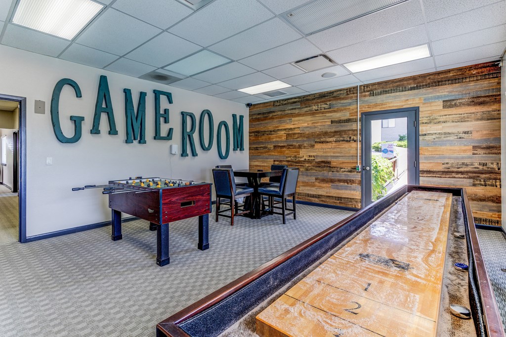 Game room with a pool table and game room sign  at Union Heights Apartments, Colorado Springs, CO