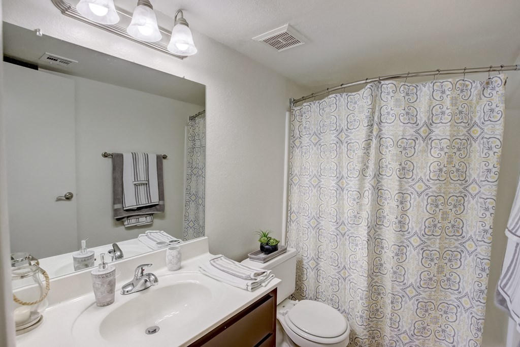 Bathroom with Vanity, Toilet & Shower with a curtain at Glen at Mesa Apartments, Mesa