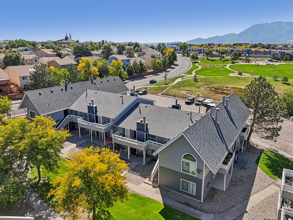 A residential area with houses and trees.