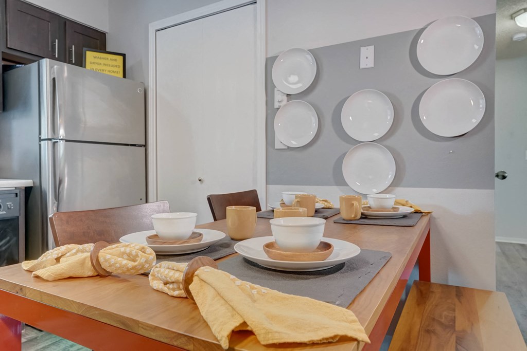 Dining table with plates and cups on top of it at Governor's Park, Fort Collins, 80525