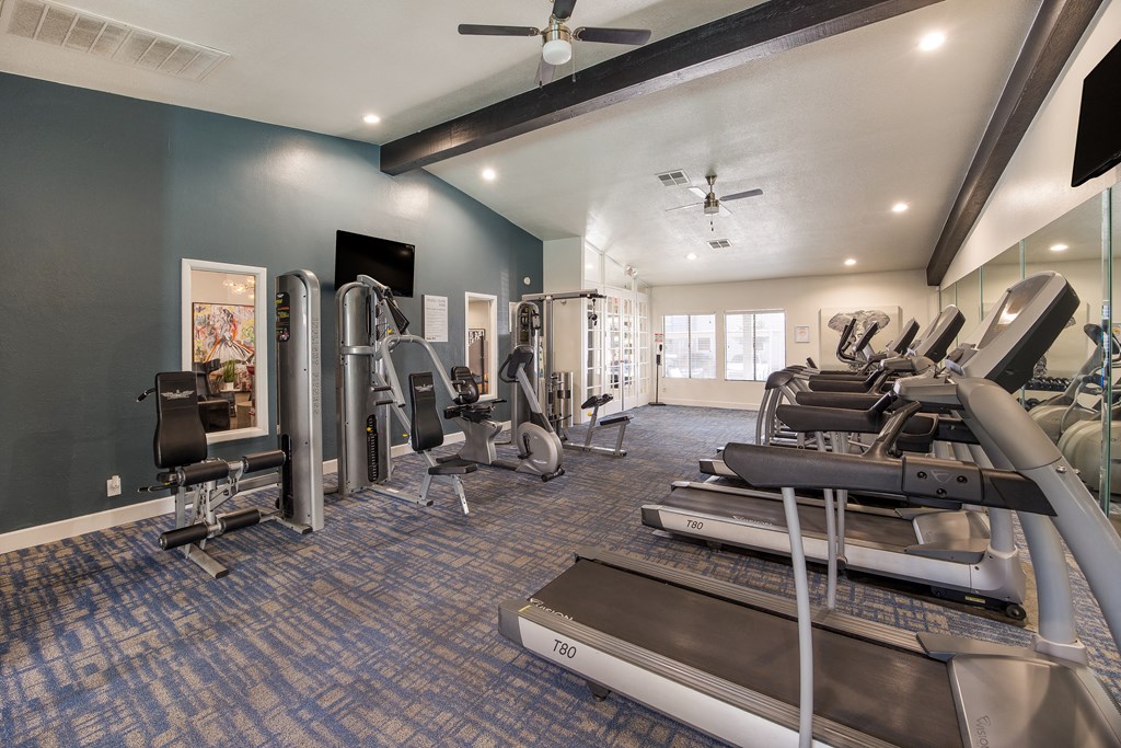 Gym with treadmills and other cardio equipment at 2900 Lux Apartment Homes, Nevada