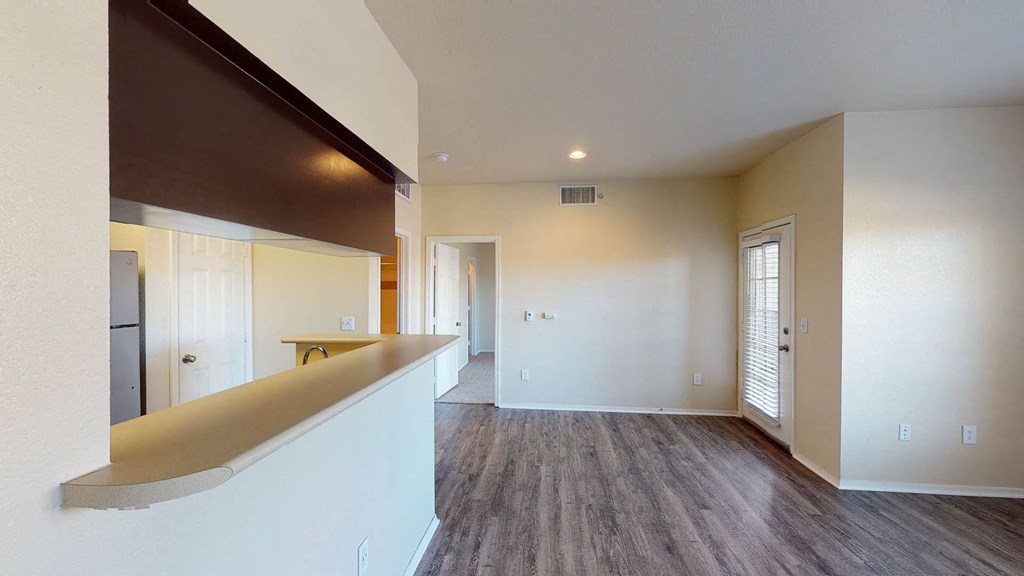 Kitchen with Breakfast Bar at Heritage at Stone Mountain, Colorado 80233