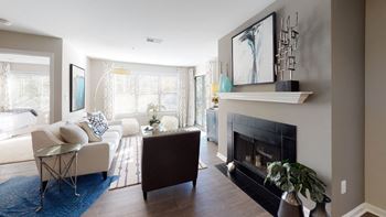 Living Room With Standard Fireplace at Heritage at Waters Landing, Maryland