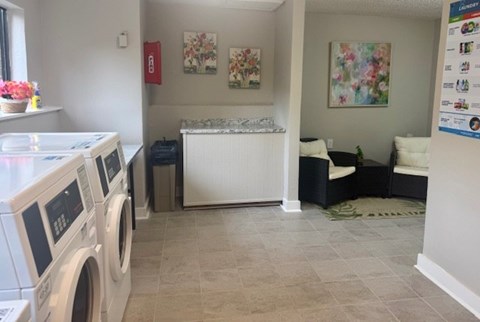 A laundry room with a washer and dryer.