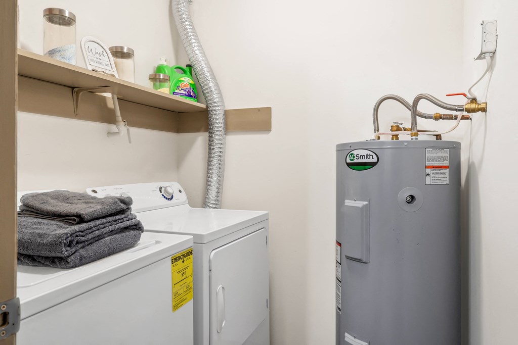 Laundry room with a washer and dryer at Lofts of Wilmington, Wilmington, NC