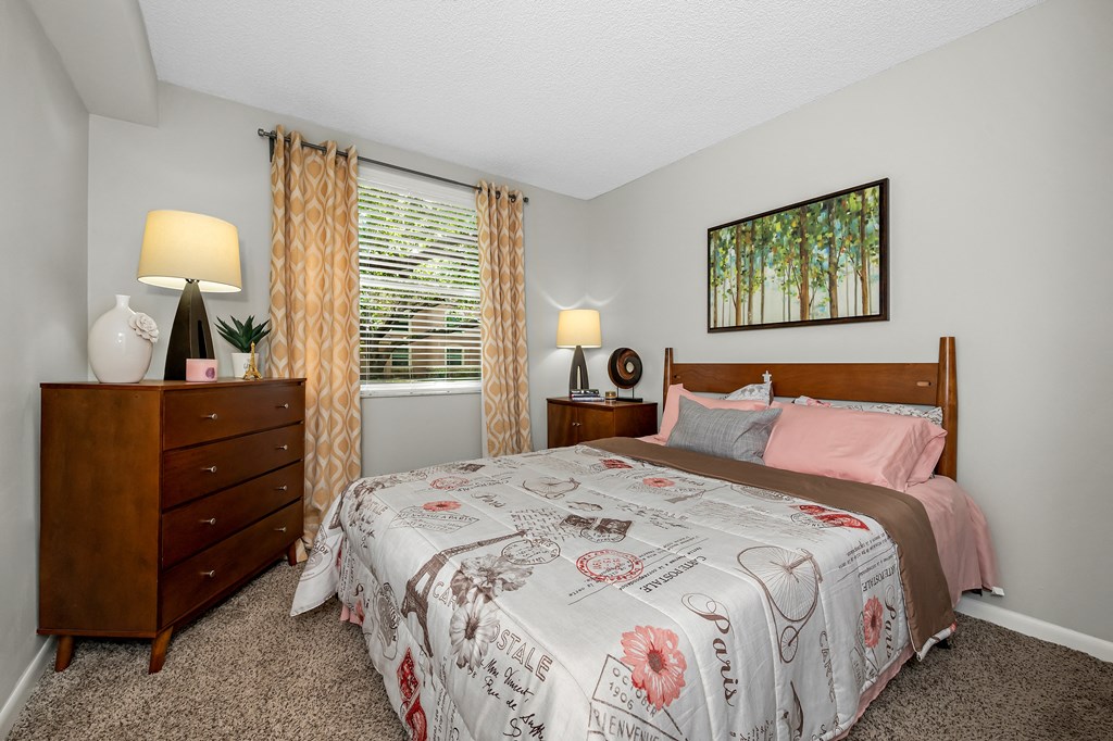 Bedroom with nightstand with lamps at Pembroke Pines Landings, Pembroke Pines, FL, 33025