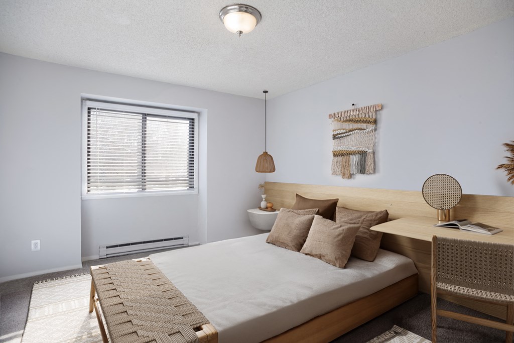 Bedroom with a bed and a desk at Governor's Park, Fort Collins, 80525