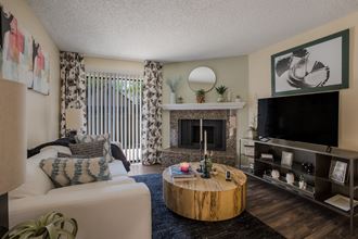 Living room  with fireplace   at Mountain Run, New Mexico, 87111