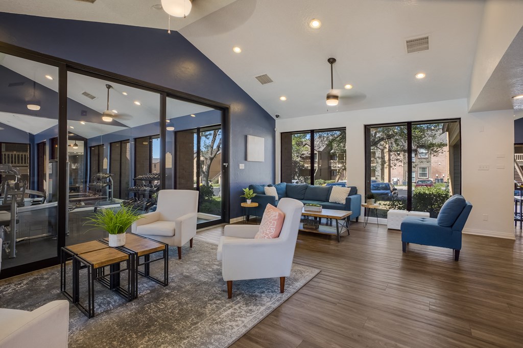 Resident lounge with couches and chairs at Mountain Run Apartments, New Mexico, 87111