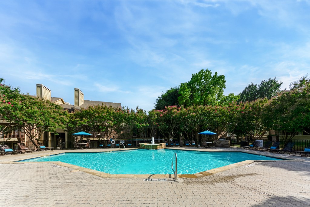 a swimming pool at the resort at governors residence at The Glen Apartments, Texas, 75067