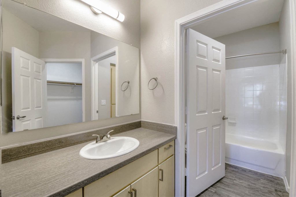 Renovated Bathrooms With Quartz Counters at Sweetwater At Metro North, Phoenix, AZ