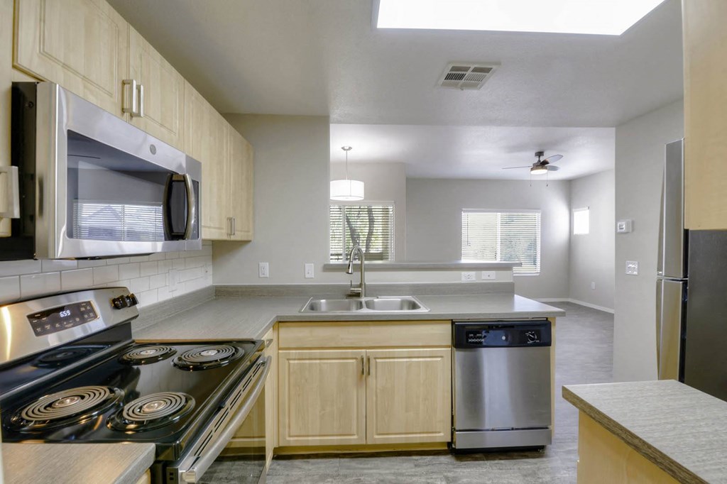 Chef-Inspired Kitchens Feature Stainless Steel Appliances at Sweetwater At Metro North, Phoenix, AZ