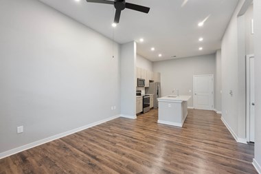 Room with wooden flooring at AxisOne, Stuart, Florida - Photo Gallery 4