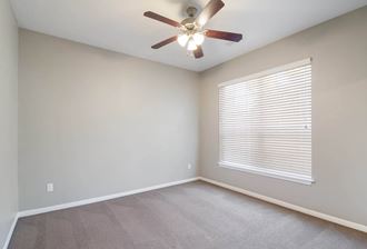 Bedroom with Ceiling Fan at Bridford Lake Apartments, Greensboro, NC