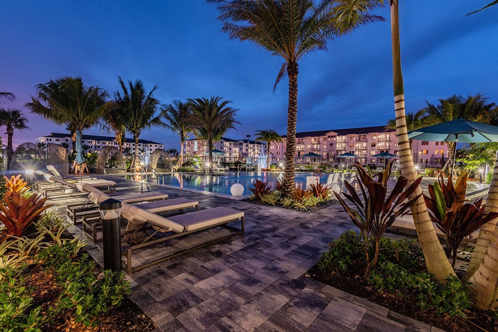 View of Tropical Courtyard at Night at Edge75, Naples, FL