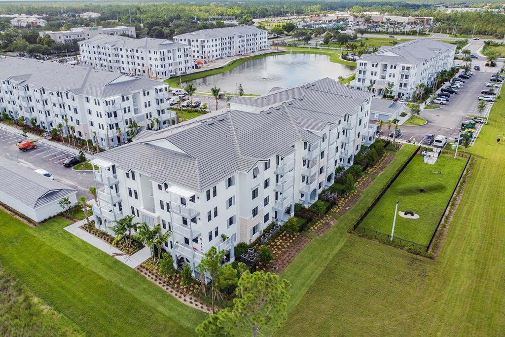 Aerial View of Apartment Buildings and Greenery at Edge75, Naples, FL 34104