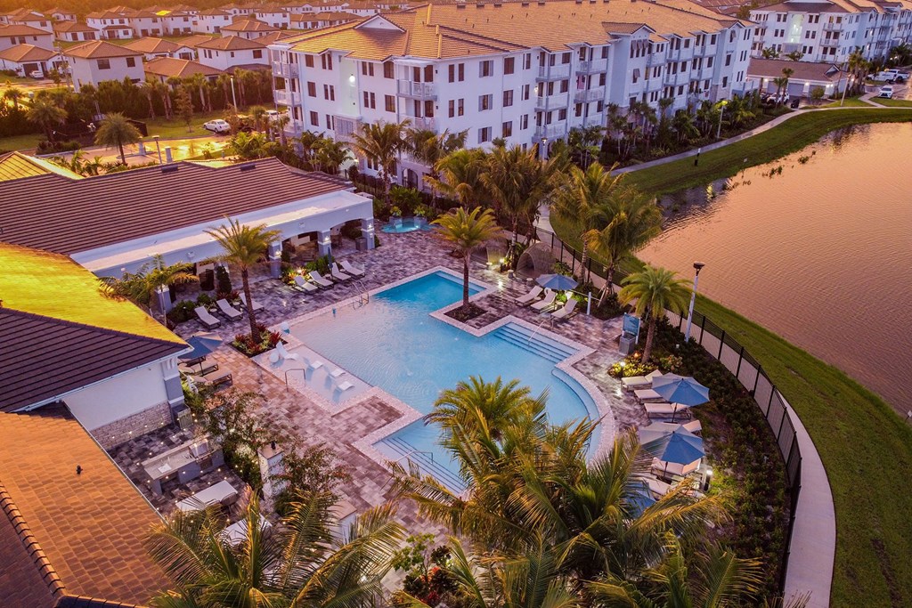 Aerial View of Community Lake and Pool at Sunset at Edge75, Naples