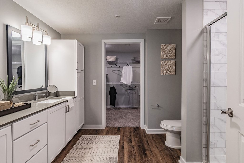 Master Bathroom with Vanity and Closet at Edge75, Naples, Florida 34104