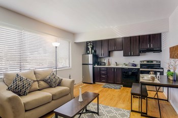 Living Room With Kitchen Living Room With Kitchen at Governor's Park, Colorado, 80525 - Photo Gallery 5