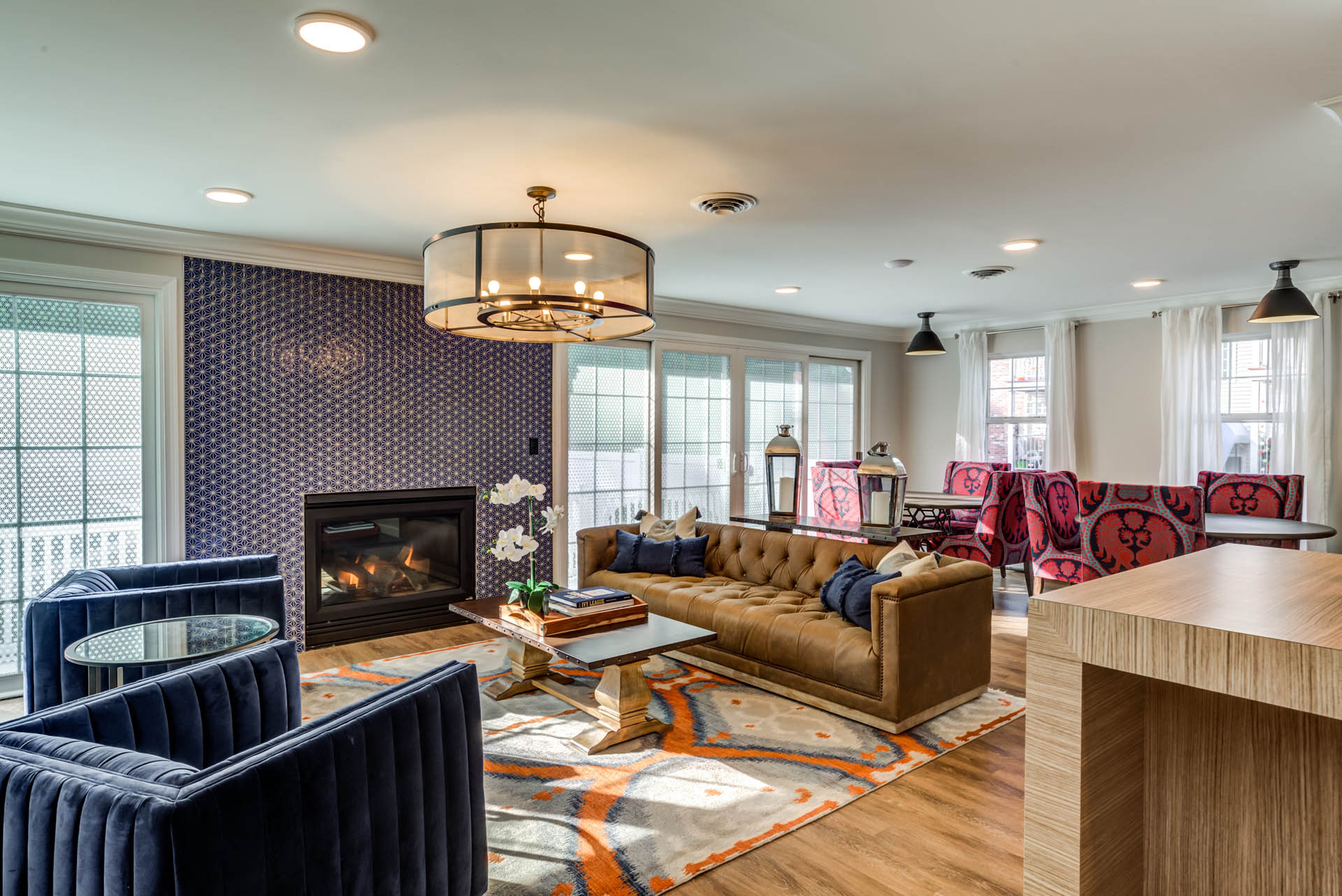 a living room with a couch and a fireplace