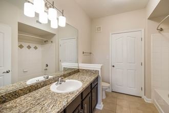 Bathroom With vanity Lights at Kingwood Glen, Texas, 77339 - Photo Gallery 5