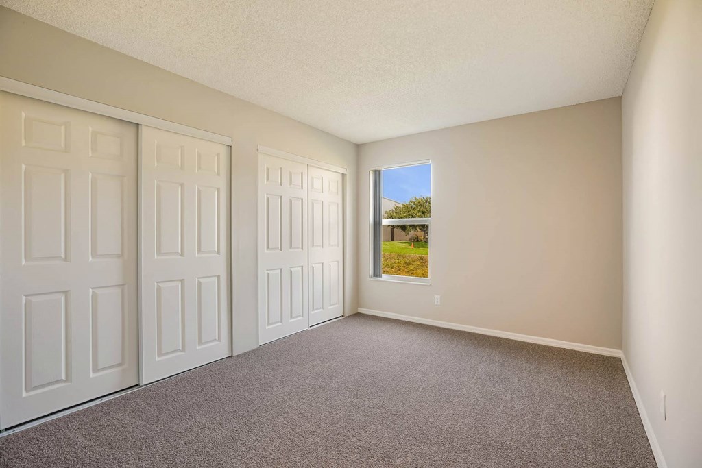 Bedroom with Multiple Closets at Lakeside Glen Apartments, Florida