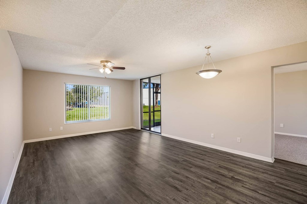 Living Room with Wood Style Flooring at Lakeside Glen Apartments, Melbourne, FL, 32904