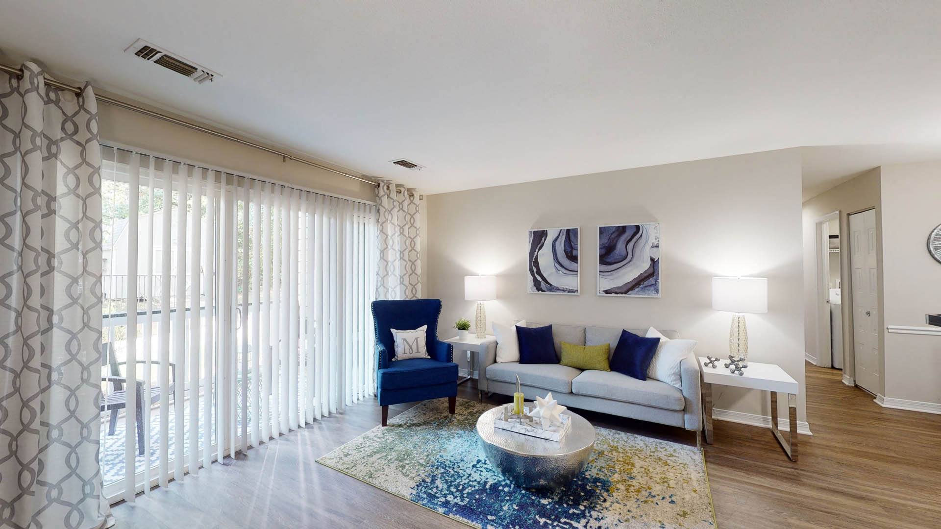 a living room with a couch and a table