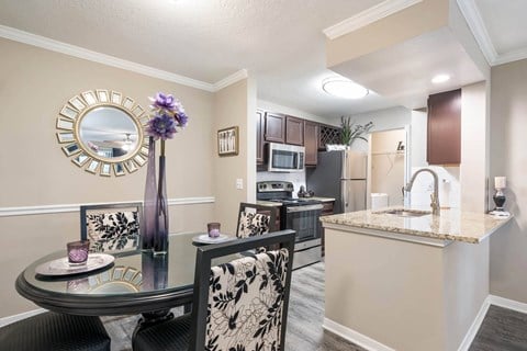 Kitchens with Breakfast Bar at The Parkway at Hunters Creek, FL 32837