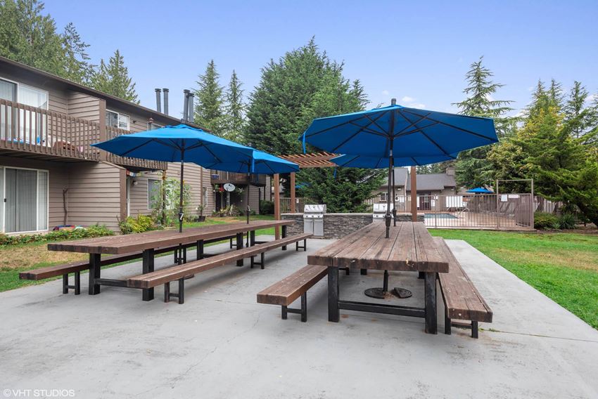 Picnic Tables with Umbrellas Picnic Tables with Umbrellas at North Creek Apartments, Washington - Photo Gallery