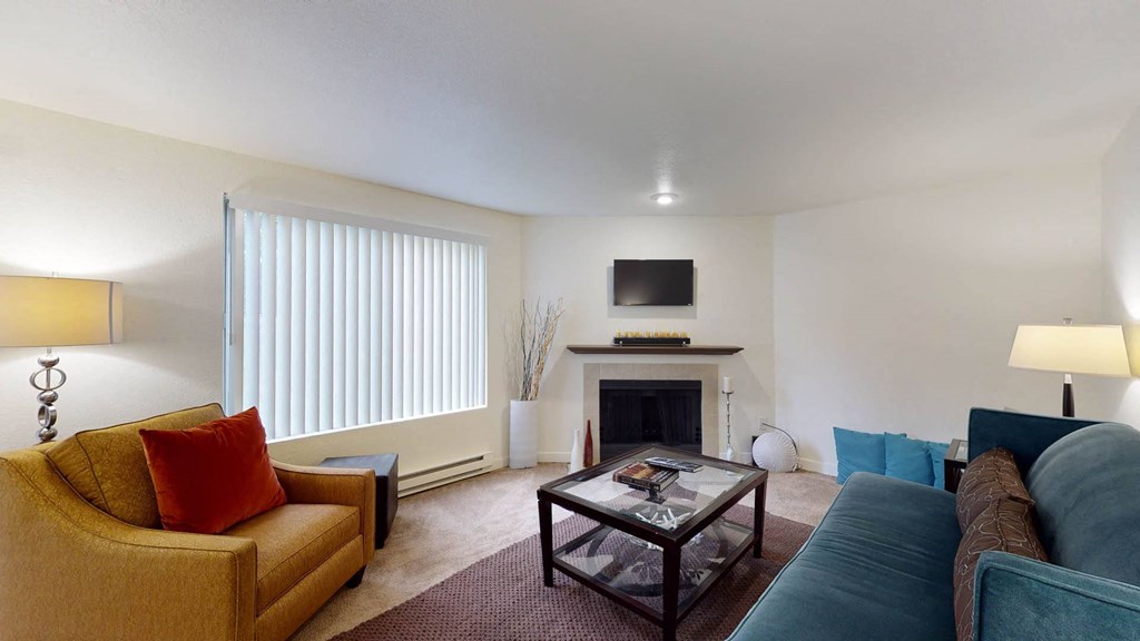 Living room with firepit at North Creek Apartments, Washington, 98208